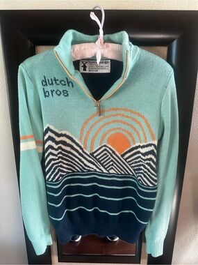 Dutch Bros Aqua and Navy Scenic Zip Pullover